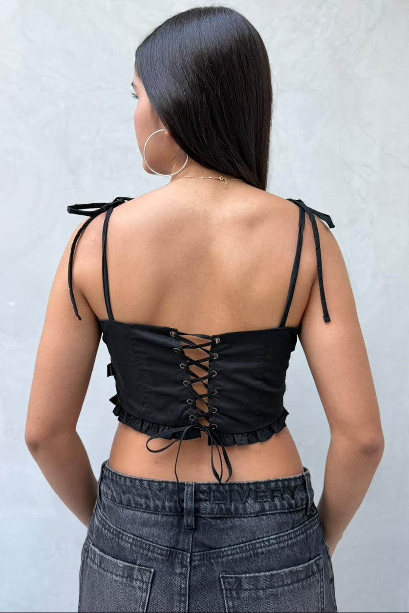 Blusa Agustina croptop con bolerito en borde dobladillo frente y tira de amarre en moño - Negro