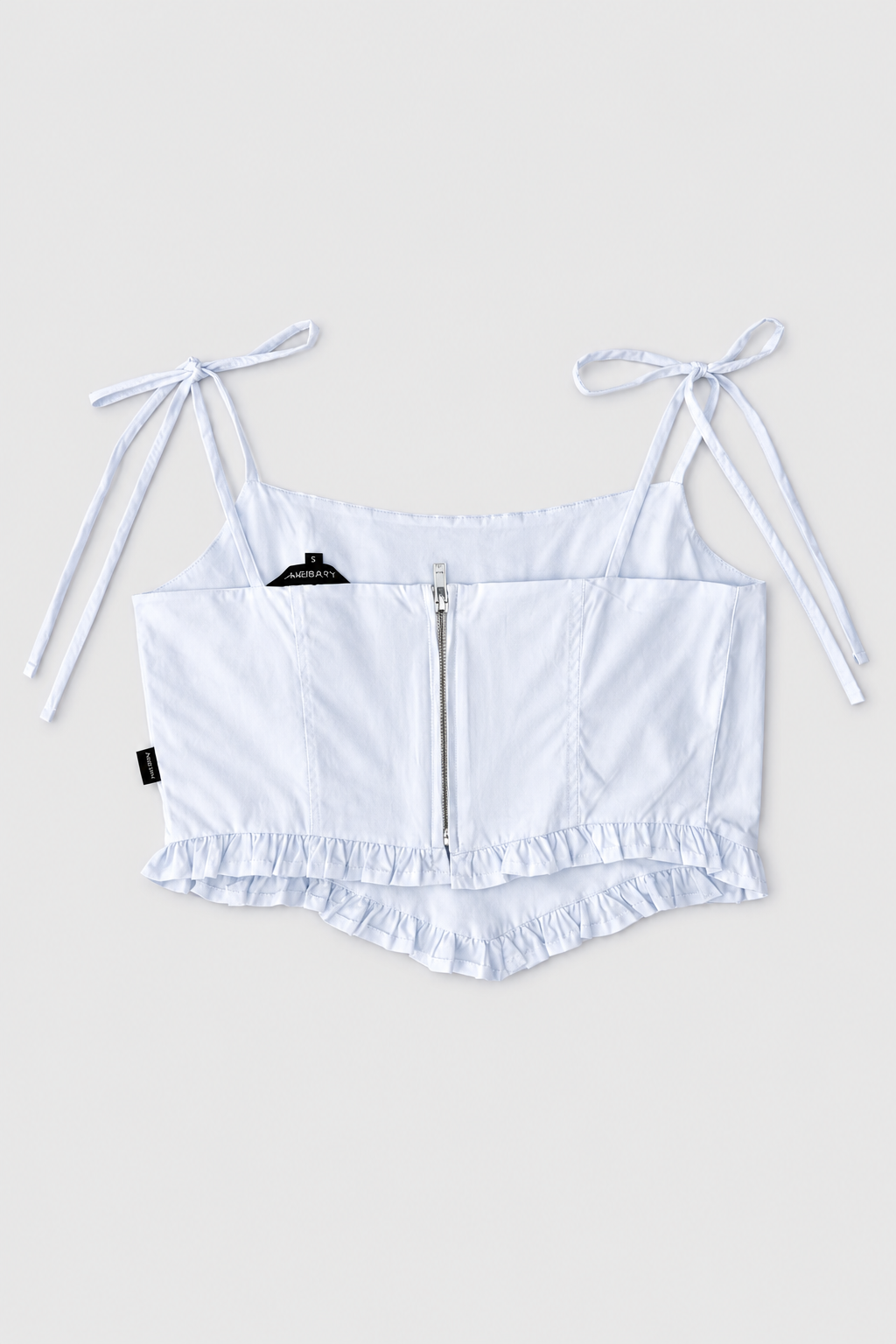 Blusa Agustina croptop con bolerito en borde dobladillo frente y tira de amarre en moño - Blanco