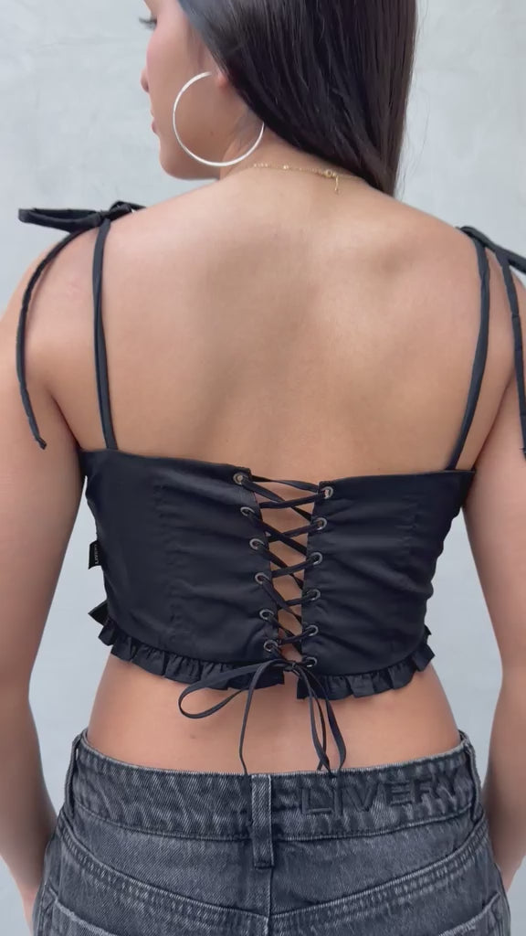 Blusa Agustina croptop con bolerito en borde dobladillo frente y tira de amarre en moño - Negro